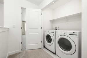 Laundry Room with washer and dryer