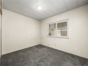 Spare room with carpet floors