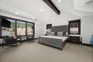 Bedroom featuring vaulted ceiling with beams, baseboards, recessed lighting, and light colored carpet