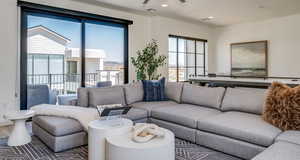 Living room featuring visible vents and recessed lighting