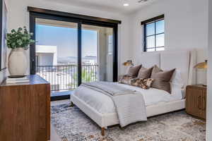 Carpeted bedroom featuring visible vents, access to exterior, and recessed lighting
