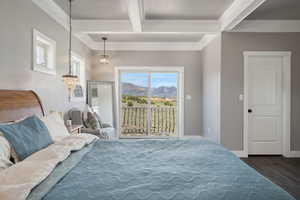 Bedroom with crown molding, coffered ceiling, beam ceiling, dark wood finished floors, and access to outside