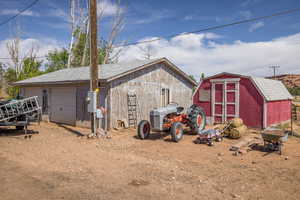 View of outbuilding featuring an outdoor structure