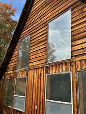 View of side of home featuring board and batten siding