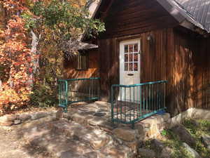 Exterior space featuring metal roof