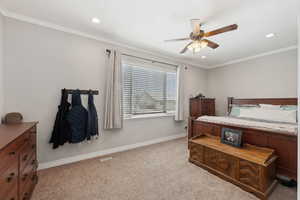 Bedroom with light carpet, ornamental molding, recessed lighting, and baseboards