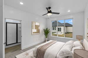 Bedroom with recessed lighting, a ceiling fan, and baseboards