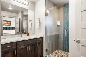 Ensuite bathroom featuring connected bathroom for bedroom 2