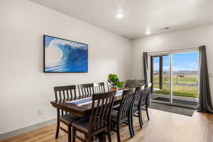 Dining area seats 8 so comfortable seat 12 with the island seating.