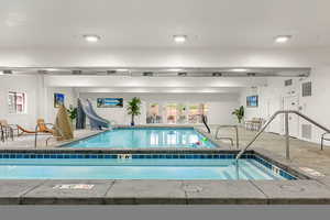 Waterdance Rec Center hot tub, indoor pool with a water slide