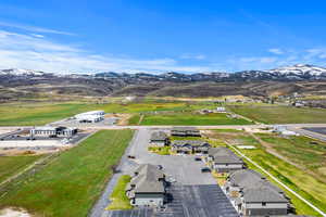 Birds eye view of property with a mountain view