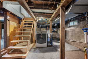 Basement with washer / clothes dryer
