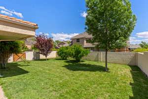 View of yard with a fenced backyard