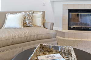 Interior space featuring a tile fireplace