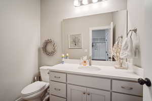 Half bath with toilet and vanity