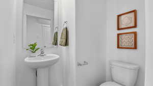 Bathroom with toilet and a sink