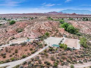 Aerial view with view of desert, a mountain view, and a rural view