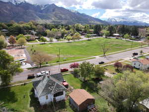 Birds eye view of property featuring a mountain view