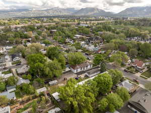Birds eye view of property featuring a mountain view and a residential view