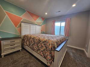 Bedroom featuring recessed lighting, baseboards, visible vents, and dark colored carpet