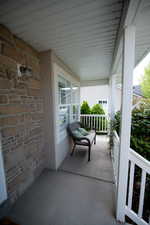 Balcony featuring covered porch