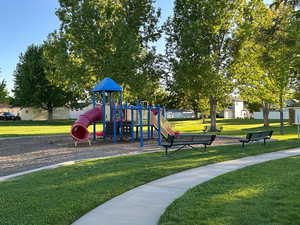 Community jungle gym featuring a yard