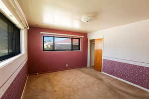 Spare room featuring carpet floors