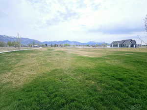 Property view of mountains featuring a rural view