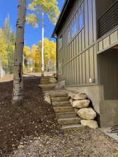 View of side of property featuring board and batten siding