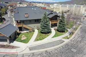 Drone / aerial view featuring a residential view and a mountain view