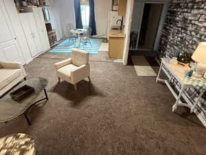 living area featuring open floor plan with kitchen,