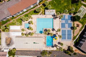 Hub pool, hot tub, with snack shack, indoor pool, water slides, splash pad, pickle ball, billiards, ping pong, giant chess set, and fitness center.