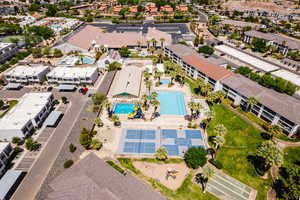 Hub pool, with hot tub, snack shack, indoor pool, water slides, pickle ball, billiards, ping pong, and fitness center.