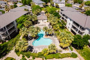 Fitness center with family pool and hot tub.