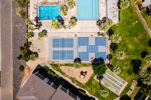 Hub pool, with hot tub, with snack shack, indoor pool, water slides, splash pad, pickle ball, billiards, ping pong, giant chess set, and fitness center.