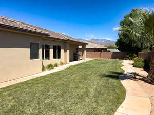View of yard with a mountain view