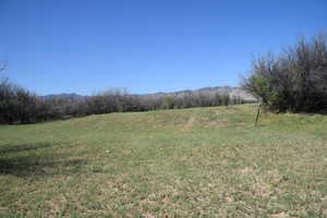 Exterior space featuring a rural view and a mountain view