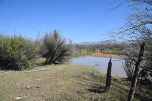 Property view of water with a mountain view