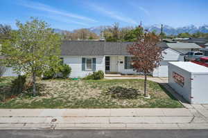 Single story home featuring a mountain view