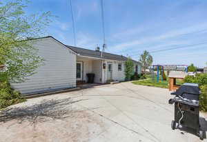 Back of property featuring a patio