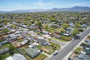 Drone / aerial view with a residential view and a mountain view