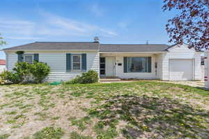 Single story home featuring a garage