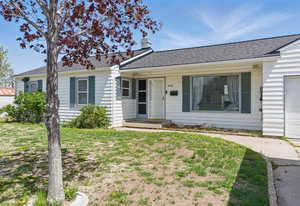 Single story home with a garage and driveway