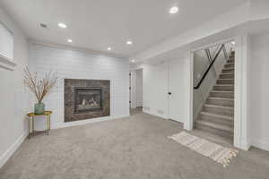 Living room featuring recessed lighting and carpet flooring