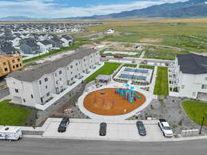 Birds eye view of property with a mountain view
