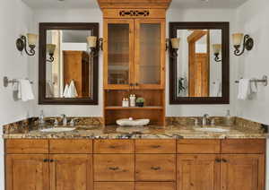 Bathroom with double vanity and a sink