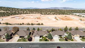 Drone / aerial view with a mountain view and a residential view