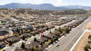Drone / aerial view with a residential view and a mountain view