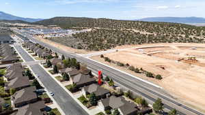 Birds eye view of property with a mountain view