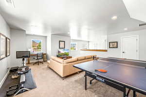 Game room featuring visible vents, recessed lighting, baseboards, and light colored carpet